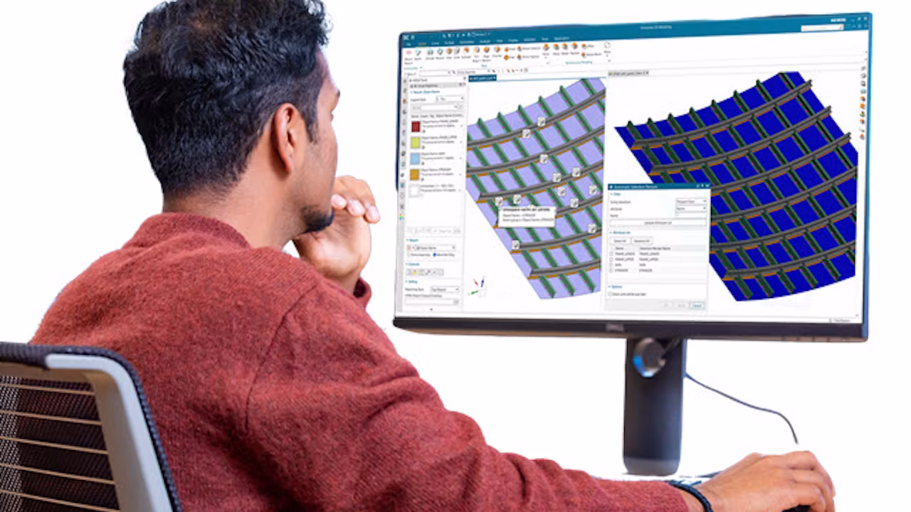 A person using Simcenter 3D software on their desktop computer.